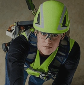 Industrial worker wearing hard hat and headset